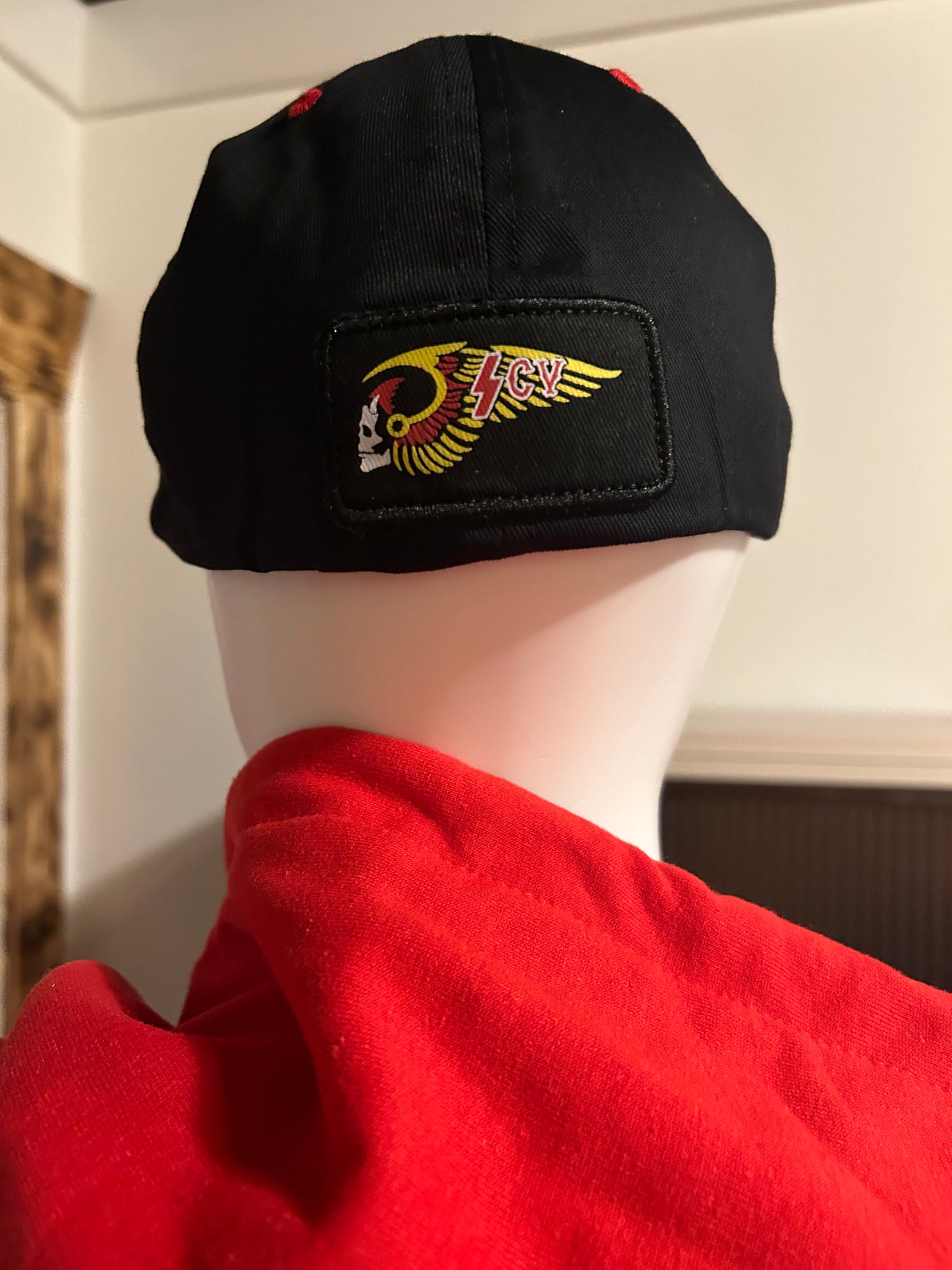 Black curved bill members hat